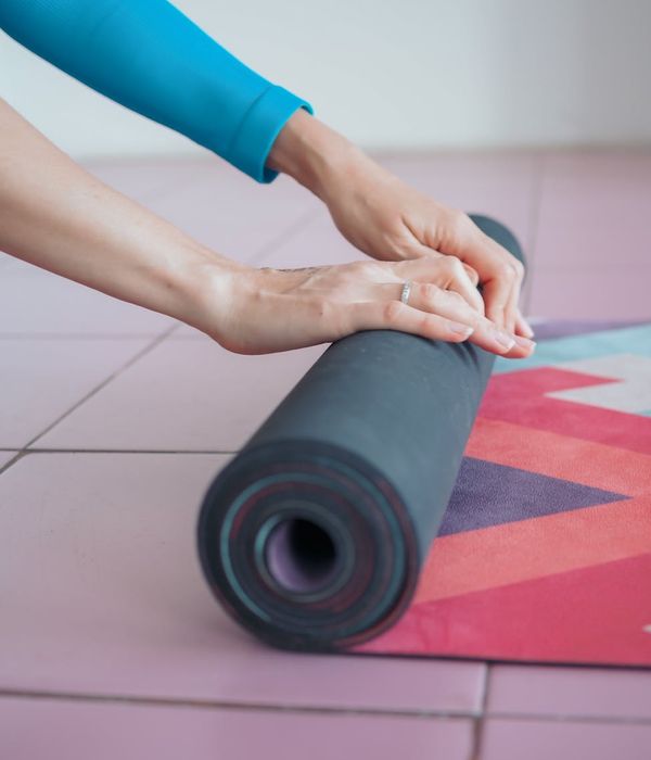 Person practicing gentle yoga movements for coordination